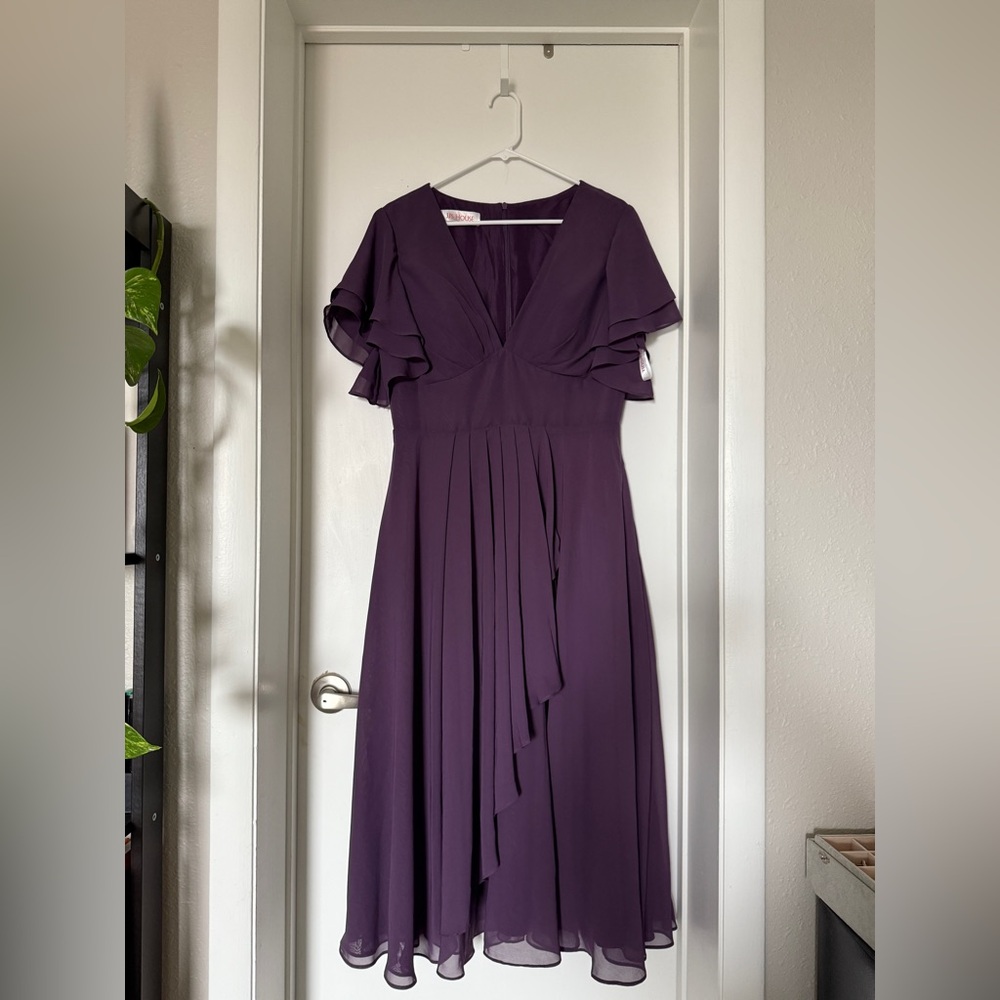 Plum colored formal dress from JJ House in size US 12. Never worn before.